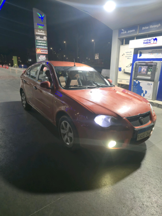 Proton Gen 2 2010 Orange Automatic Used for Sale in Greater Cairo ( Cairo + Giza)