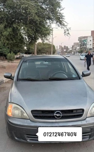 اوبل كورسا 2003 رمادي غامق أوتوماتيك مستعملة للبيع في المنيا‎
