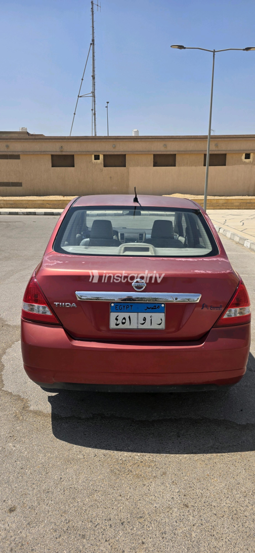 Nissan Tiida 2010 Red Automatic Used for Sale in Greater Cairo ( Cairo + Giza) - 6