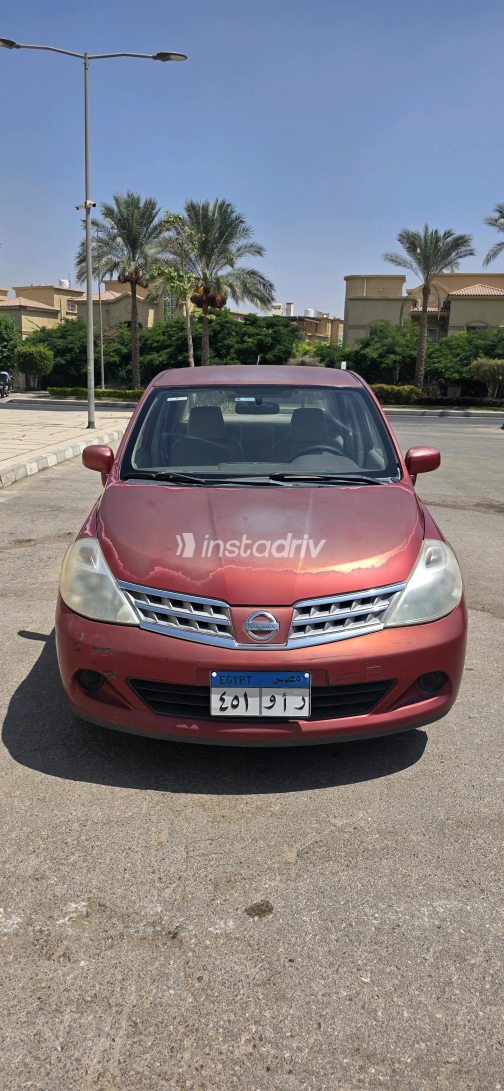 Nissan Tiida 2010 Red Automatic Used for Sale in Greater Cairo ( Cairo + Giza) - 9