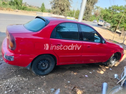 دايو لانوس 2 2001 أحمر يدوي مستعملة للبيع في القاهرة الكبرى ( القاهرة - الجيزة) - 10