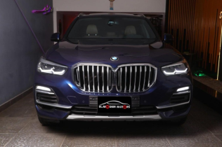 بي ام دبليو X5 2021 أزرق غامق أوتوماتيك مستعملة للبيع في مدينة الشيخ زايد