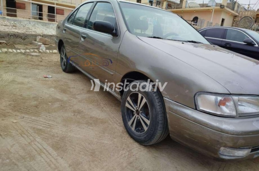نيسان صنى 2000 برونزي أوتوماتيك مستعملة للبيع في الهرم - 10