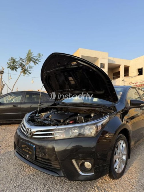 تويوتا كورولا 2015 أسود أوتوماتيك مستعملة للبيع في مدينة السادات - 6