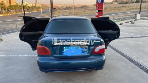 هيونداي اكسنت 2000 أزرق غامق أوتوماتيك مستعملة للبيع في مدينة الشيخ زايد - 4