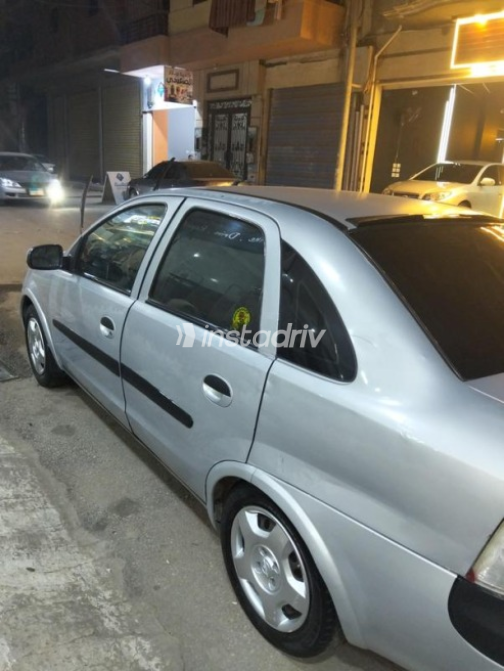 اوبل كورسا 2007 فضي أوتوماتيك مستعملة للبيع في الإسكندرية - 8