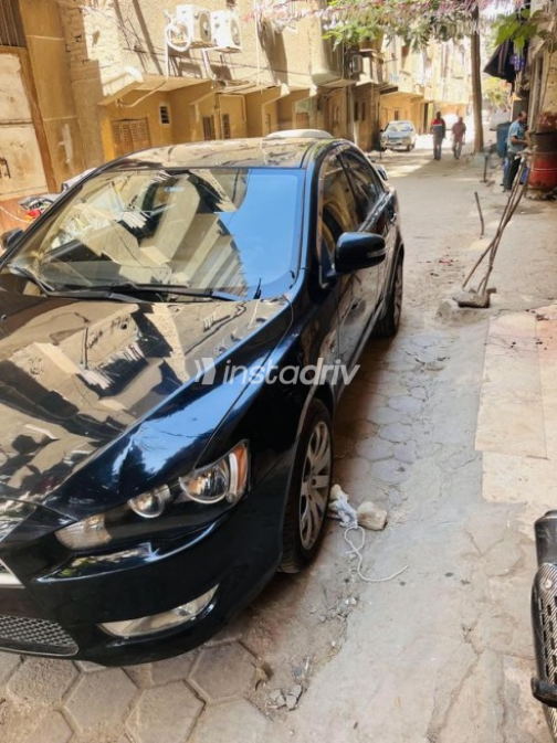 ميتسوبيشي لانسر اى اكس شارك 2015 أسود أوتوماتيك مستعملة للبيع في شبرا الخيمة - 2