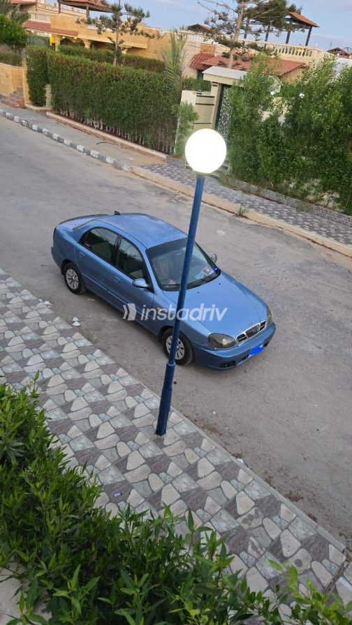 دايو لانوس 2005 أبيض يدوي مستعملة للبيع في القاهرة الكبرى ( القاهرة - الجيزة) - 1