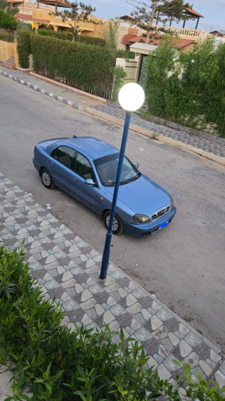 دايو لانوس 2005 أبيض يدوي مستعملة للبيع في القاهرة الكبرى ( القاهرة - الجيزة)
