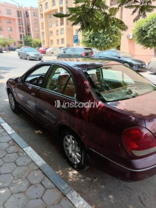 Nissan Sunny 2009 Dark Red Automatic Used for Sale in Shobra - 8