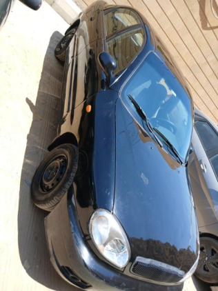 دايو لانوس 2 2005 أسود أوتوماتيك مستعملة للبيع في المقطم