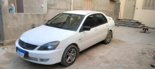 ميتسوبيشي لانسر 2011 أبيض أوتوماتيك مستعملة للبيع في القاهرة الكبرى ( القاهرة - الجيزة)