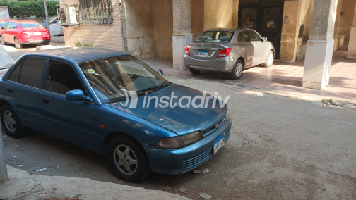 ميتسوبيشي لانسر 1993 أبيض أوتوماتيك مستعملة للبيع في القاهرة الكبرى ( القاهرة - الجيزة) - 2