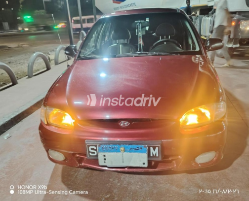 هيونداي اكسنت 2001 أحمر غامق أوتوماتيك مستعملة للبيع في حلوان - 1