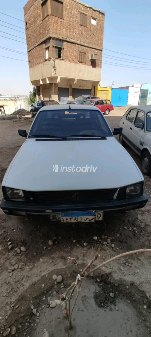 بيجو 505 1985 أبيض يدوي مستعملة للبيع في القاهرة الكبرى ( القاهرة - الجيزة) - 1
