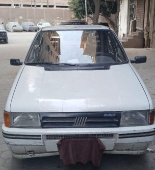 فيات اونو 1993 أبيض أوتوماتيك مستعملة للبيع في القاهرة