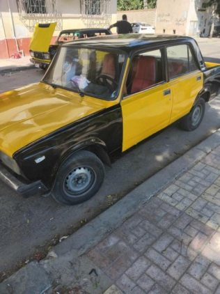 لادا 2107 2007 أصفر أوتوماتيك مستعملة للبيع في الإسكندرية