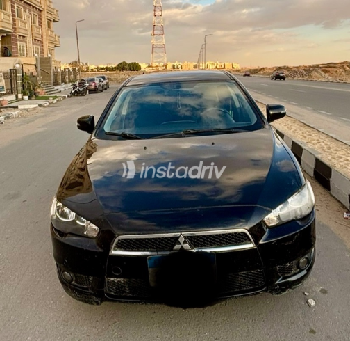 ميتسوبيشي لانسر اى اكس شارك 2015 أسود أوتوماتيك مستعملة للبيع في القاهرة الكبرى ( القاهرة - الجيزة) - 1