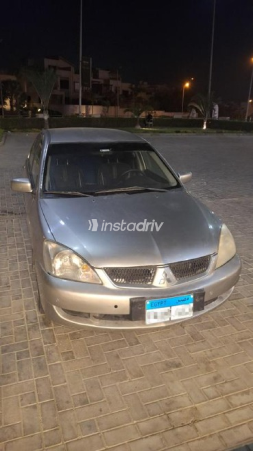 Mitsubishi Lancer Puma 2008 Silver Automatic Used for Sale in Sheikh Zayed City - 1