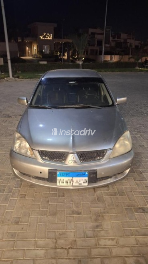 Mitsubishi Lancer Puma 2008 Silver Automatic Used for Sale in Sheikh Zayed City - 2