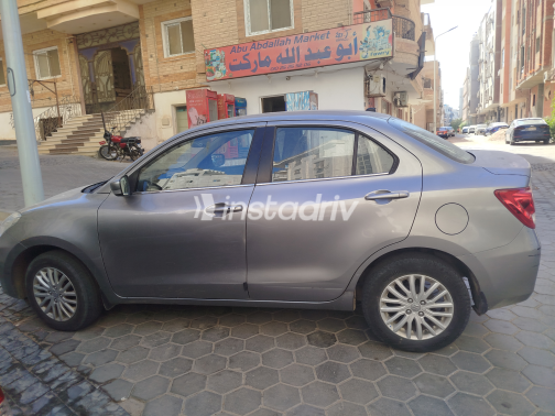 Suzuki Swift Dzire 2022 Gray Automatic Used for Sale in Greater Cairo ( Cairo + Giza) - 1