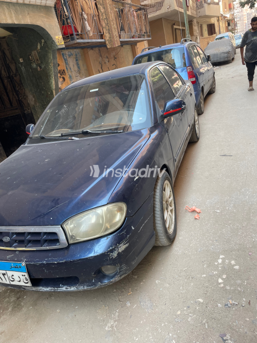 Kia Spectra 2003 Blue Manual Used for Sale in Greater Cairo ( Cairo + Giza) - 4