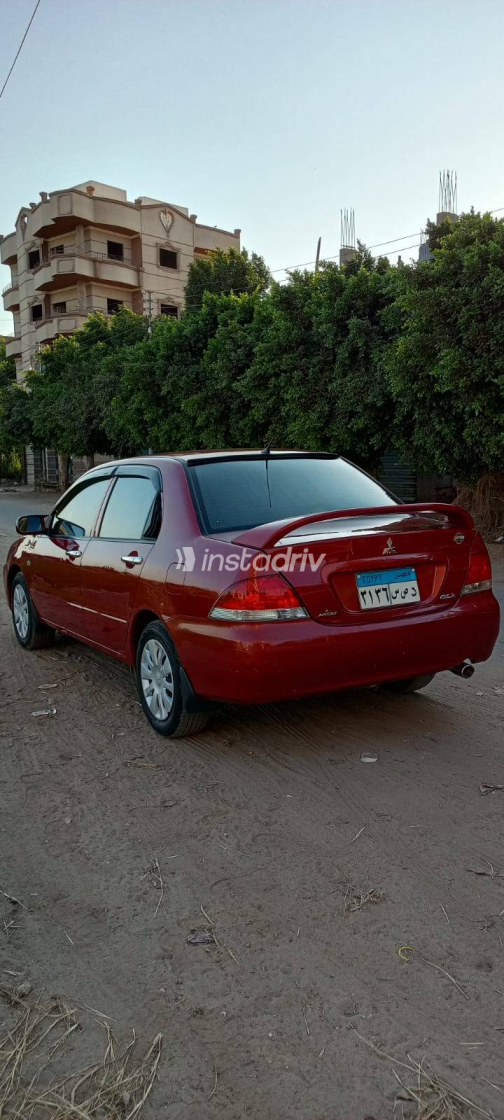 Mitsubishi Lancer Puma 2012 White Automatic Used for Sale in Greater Cairo ( Cairo + Giza) - 4