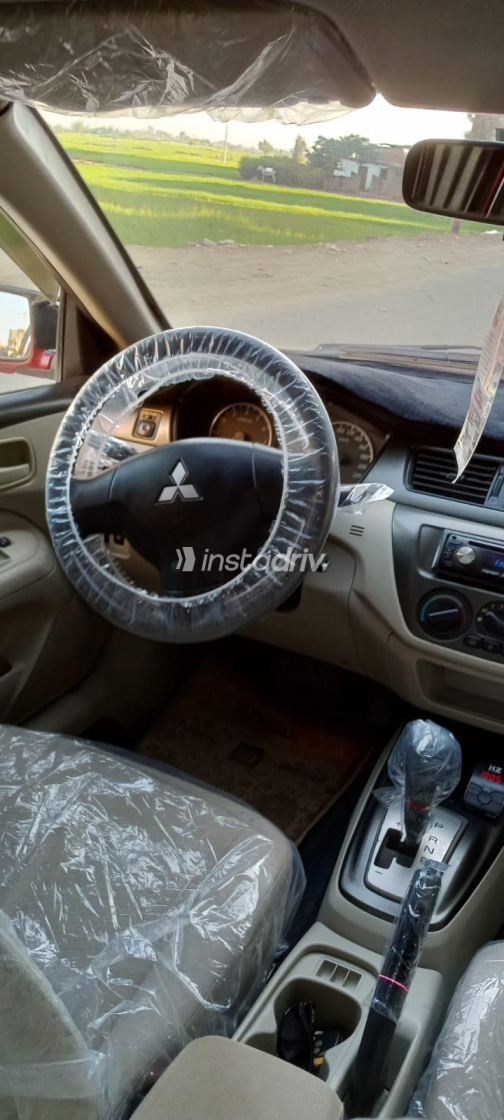 Mitsubishi Lancer Puma 2012 White Automatic Used for Sale in Greater Cairo ( Cairo + Giza) - 5