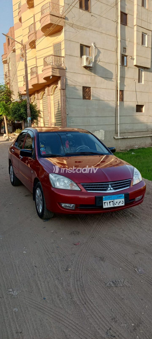 Mitsubishi Lancer Puma 2012 White Automatic Used for Sale in Greater Cairo ( Cairo + Giza) - 9