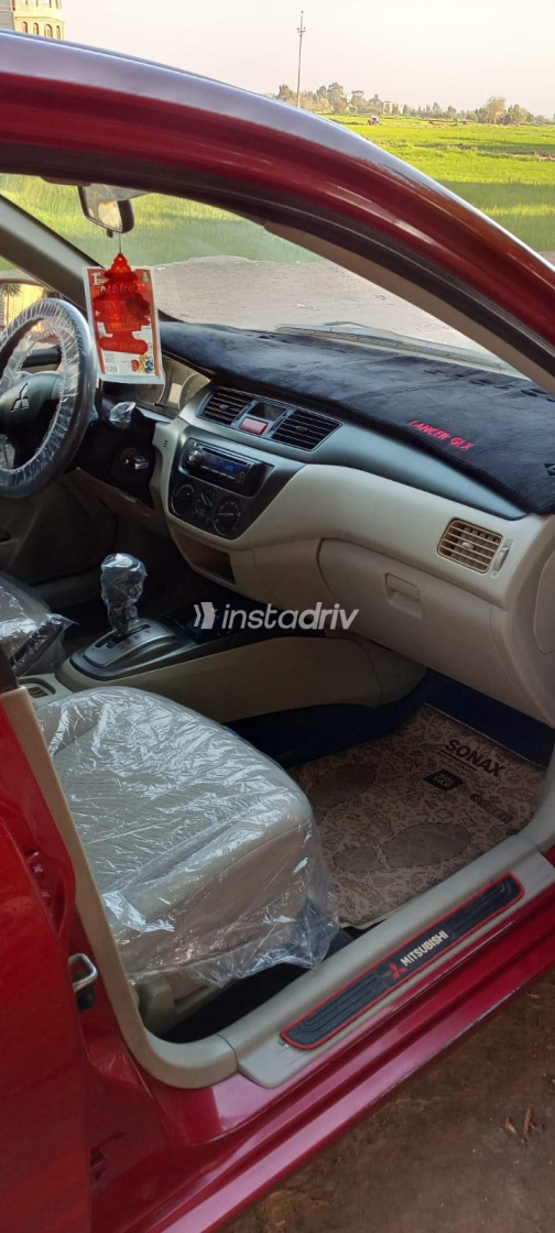 Mitsubishi Lancer Puma 2012 White Automatic Used for Sale in Greater Cairo ( Cairo + Giza) - 10