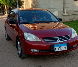 Mitsubishi Lancer Puma 2012 White Automatic Used for Sale in Greater Cairo ( Cairo + Giza)