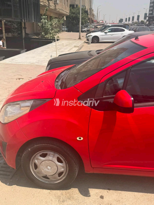 Chevrolet Spark 2012 Red Manual Used for Sale in Greater Cairo ( Cairo + Giza) - 3