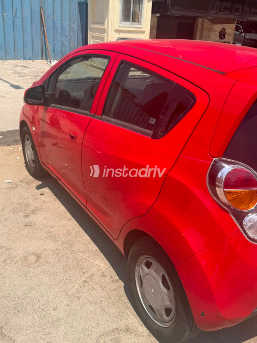 Chevrolet Spark 2012 Red Manual Used for Sale in Greater Cairo ( Cairo + Giza) - 6
