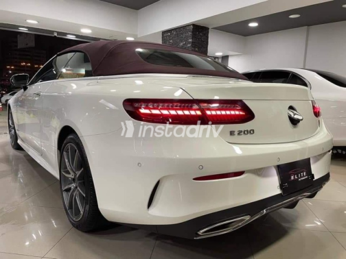 Mercedes E 200 AMG 2021 White Automatic Used for Sale in Sheikh Zayed City - 2