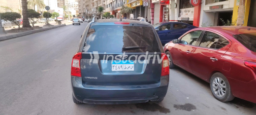 Kia Carens 2011 White Automatic Used for Sale in Greater Cairo ( Cairo + Giza) - 4