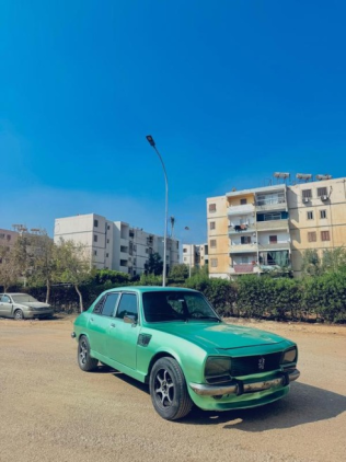 بيجو 504 1979 أخضر أوتوماتيك مستعملة للبيع في العاشر من رمضان