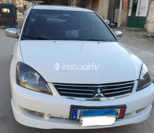 ميتسوبيشي لانسر 2008 أبيض أوتوماتيك مستعملة للبيع في العامرية - 3