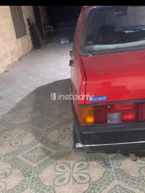 فيات ريجاتا 1990 أحمر أوتوماتيك مستعملة للبيع في مدينة الشيخ زايد - 3