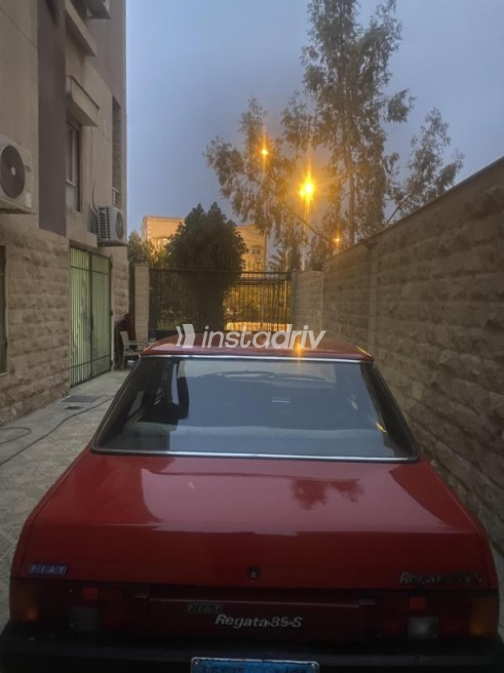 فيات ريجاتا 1990 أحمر أوتوماتيك مستعملة للبيع في مدينة الشيخ زايد - 6