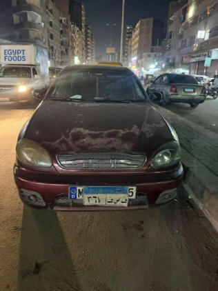 Chevrolet Lanos 2014 Dark Red Manual Used for Sale in Greater Cairo ( Cairo + Giza)
