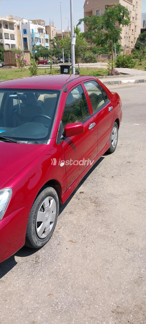 Mitsubishi Lancer 2009 Red Manual Used for Sale in Greater Cairo ( Cairo + Giza) - 2