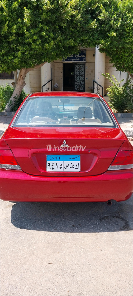 Mitsubishi Lancer 2009 Red Manual Used for Sale in Greater Cairo ( Cairo + Giza) - 3