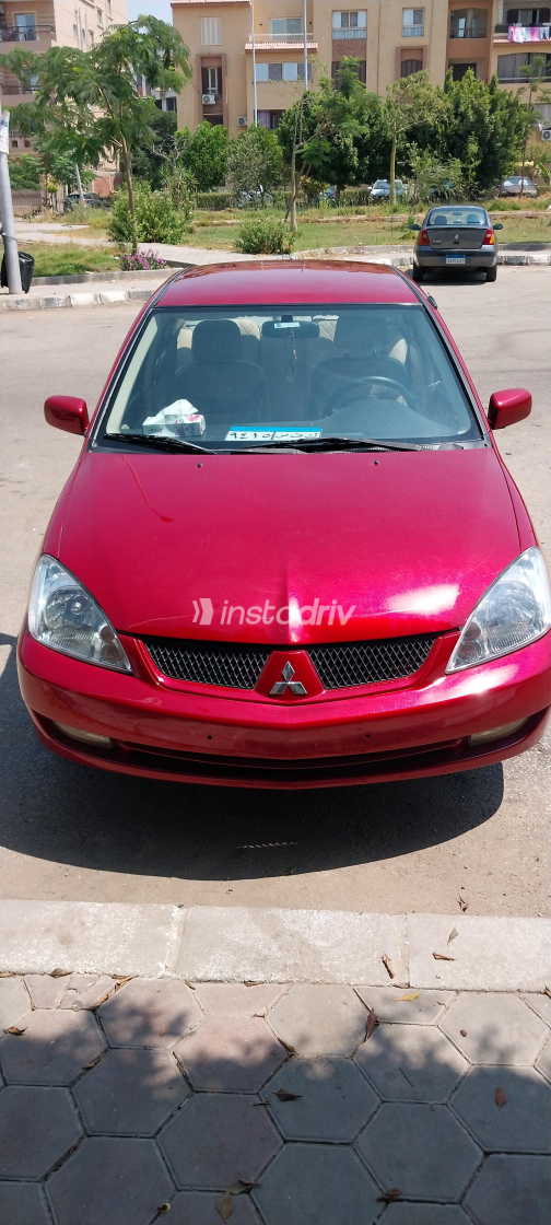 Mitsubishi Lancer 2009 Red Manual Used for Sale in Greater Cairo ( Cairo + Giza) - 7