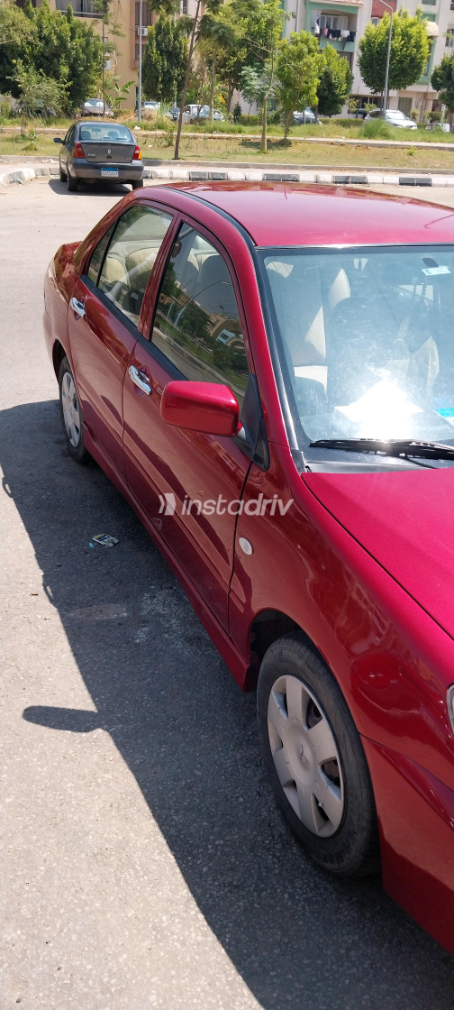 Mitsubishi Lancer 2009 Red Manual Used for Sale in Greater Cairo ( Cairo + Giza) - 8