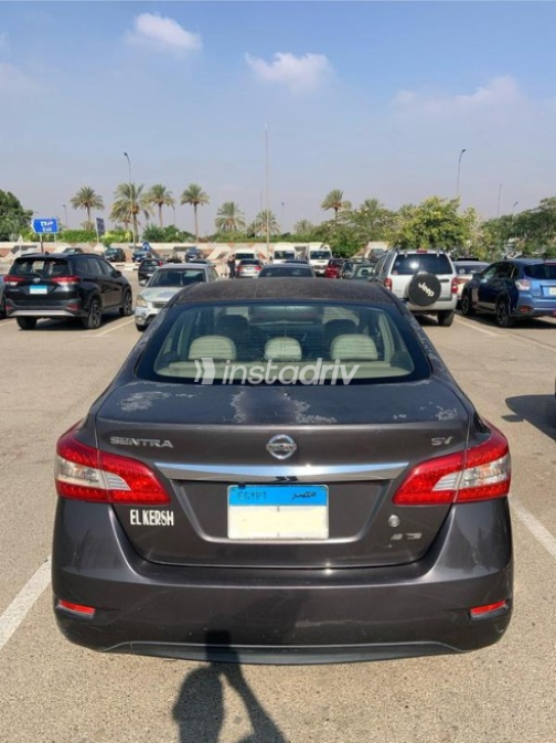Nissan Sentra 2018 Eggplant Automatic Used for Sale in Nasr city - 1