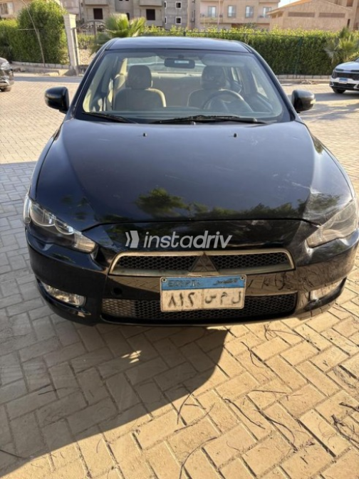 Mitsubishi Lancer EX Shark 2015 Black Automatic Used for Sale in Sheikh Zayed City - 1