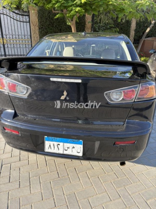Mitsubishi Lancer EX Shark 2015 Black Automatic Used for Sale in Sheikh Zayed City - 2