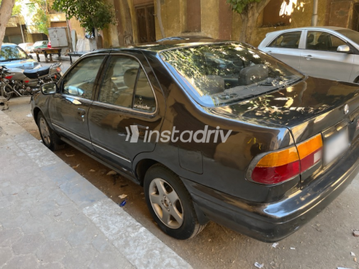 نيسان صنى 1997 رمادي غامق أوتوماتيك مستعملة للبيع في شبرا - 4