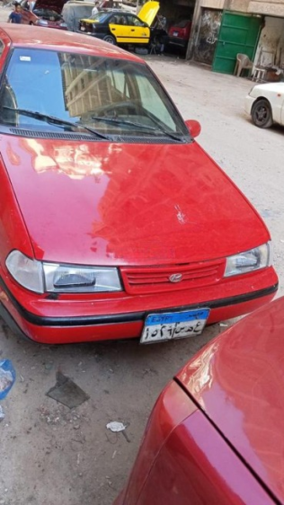 هيونداي اكسيل 1997 أحمر يدوي مستعملة للبيع في الإسكندرية