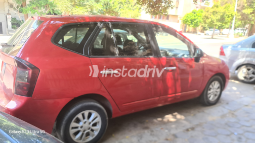 Kia Carens 2011 Red Automatic Used for Sale in Greater Cairo ( Cairo + Giza) - 3
